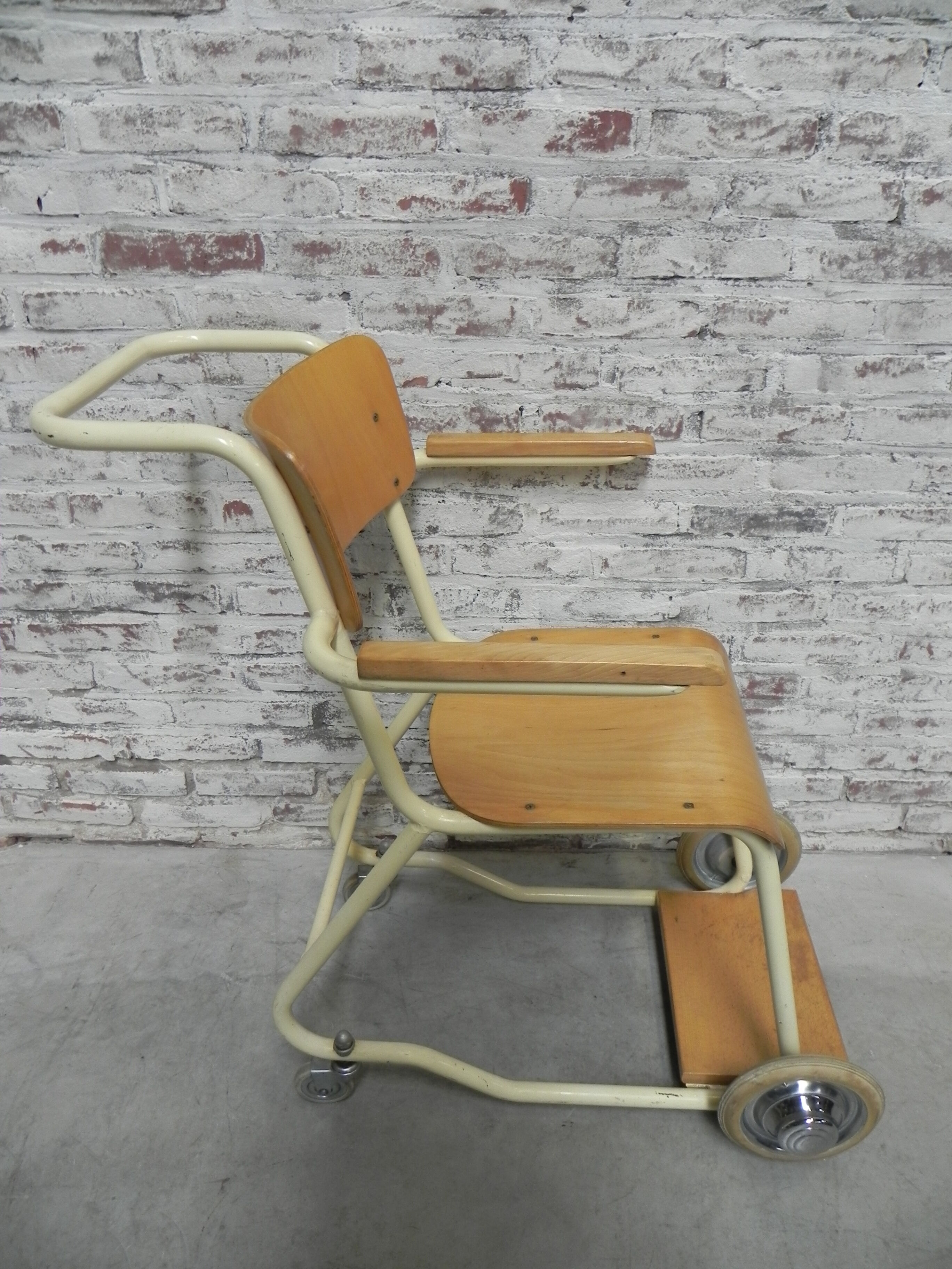 Vintage chair on wheels, wheelchair