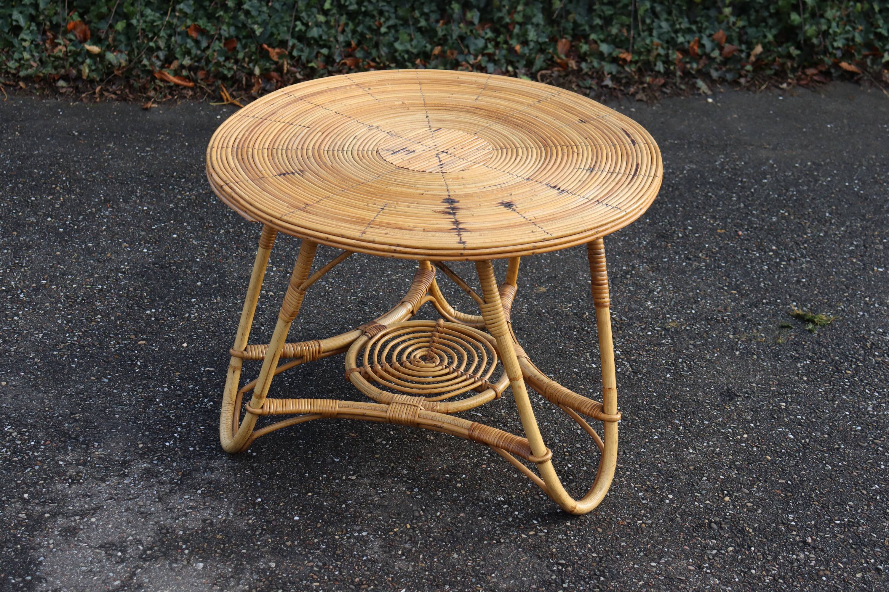 Round rattan coffee table in the Audoux Minet style