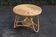 Round rattan coffee table in the Audoux Minet style