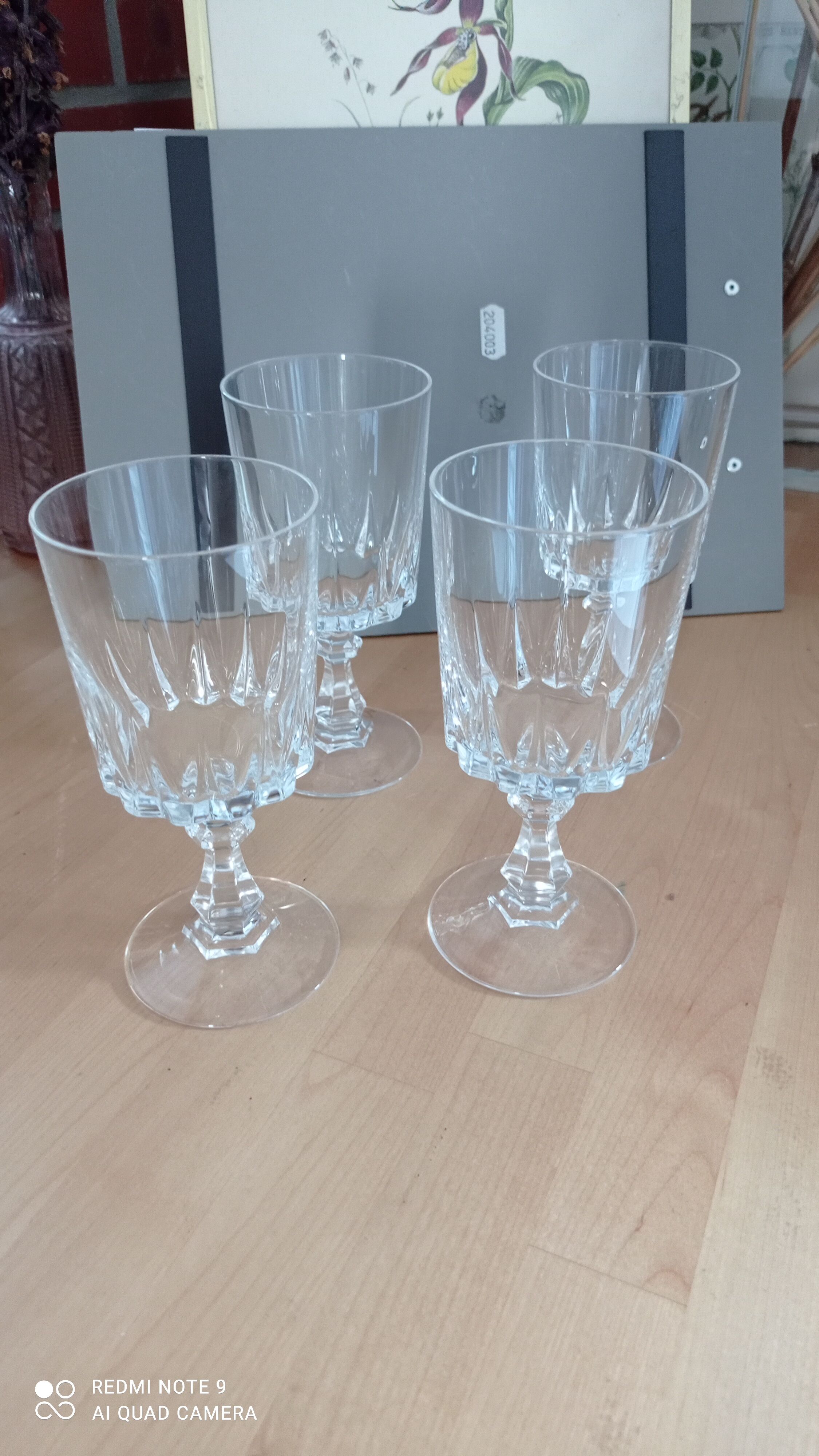 Set of four old foot glasses