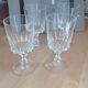 Set of four old foot glasses