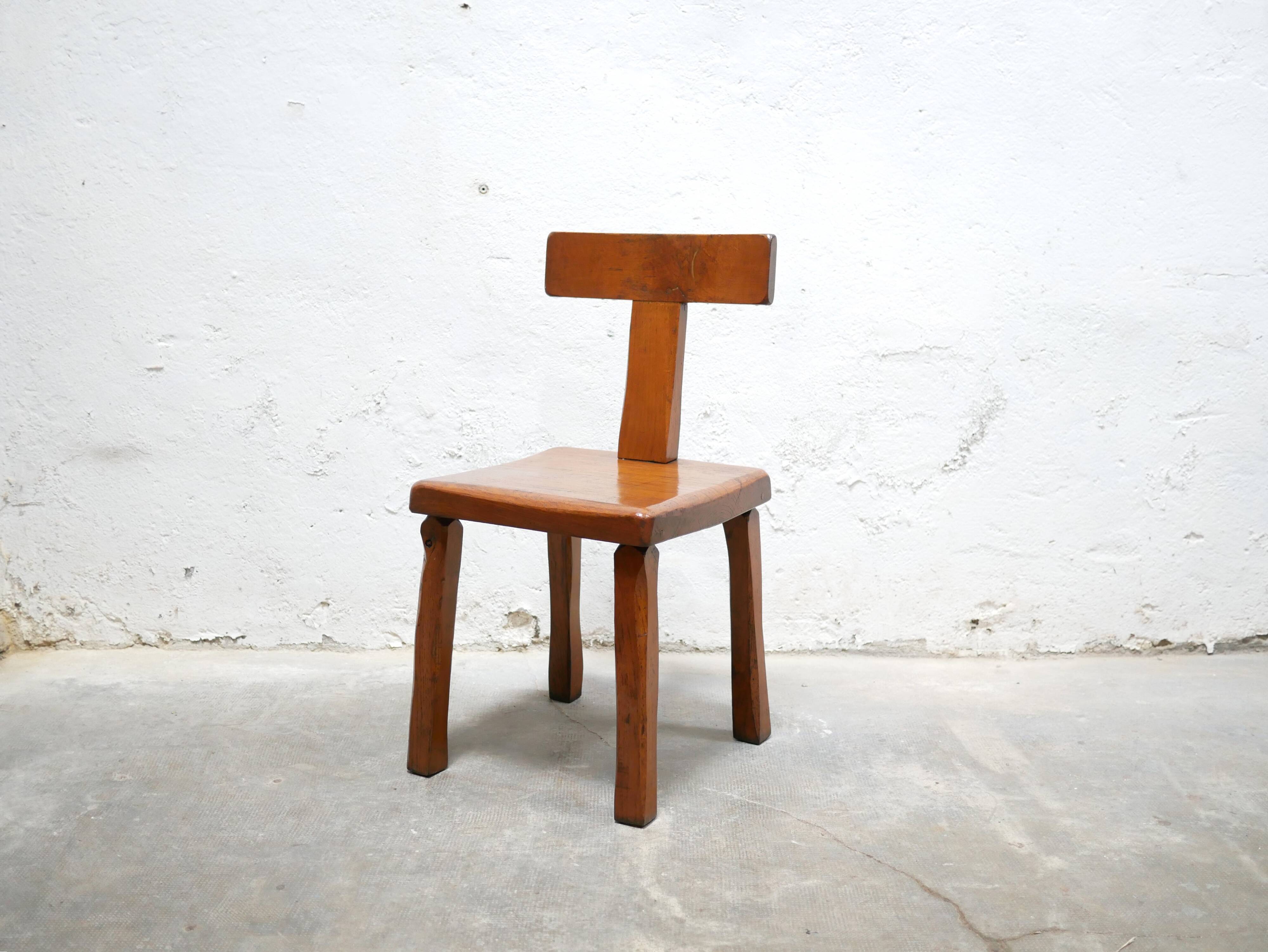 Vintage brutalist wooden T chair