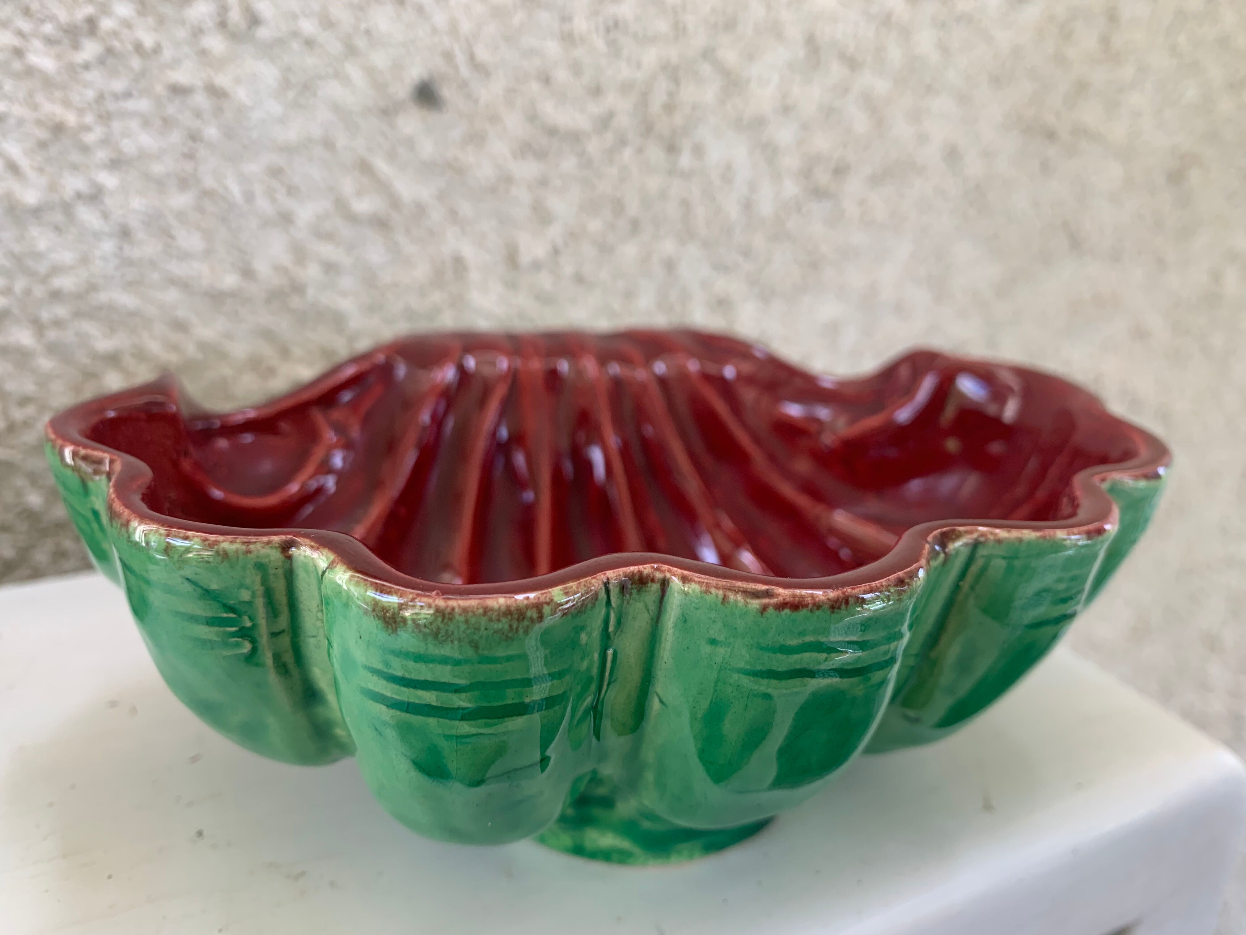 Green and red vintage dabbling enamelled ceramic shell