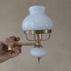 Suspension with 3 brass/opaline lights and its wall light.