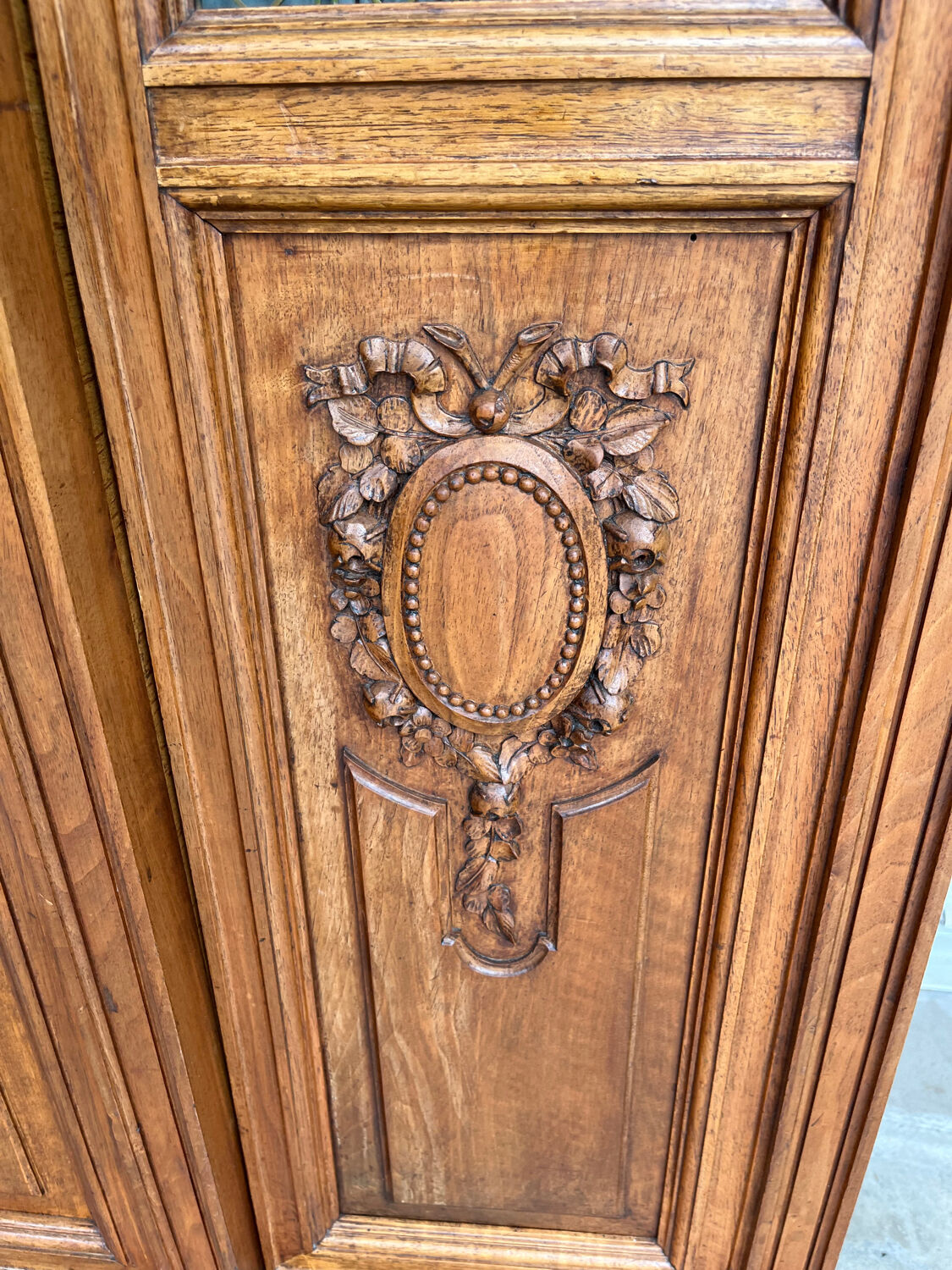 Antique carved wooden bookcase
