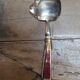 Art Deco silver and porcelain fruit ladle
