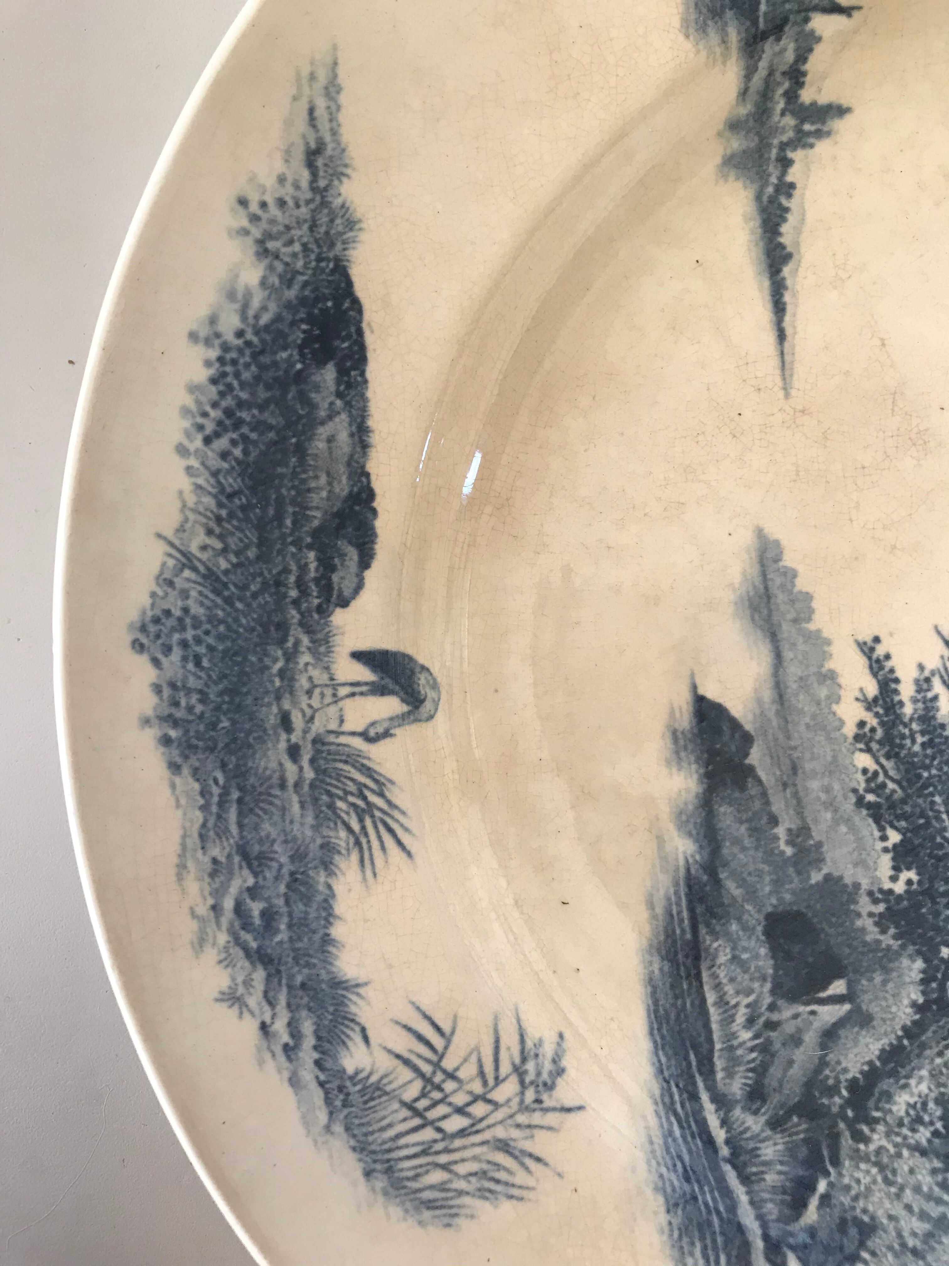 Two iron earth dishes