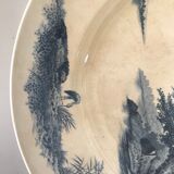 Two iron earth dishes