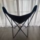 Fauteuil papillon en similicuir en parfait état
