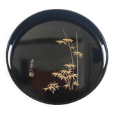 Vintage Japanese round lacquered black plate with golden bamboo decoration.