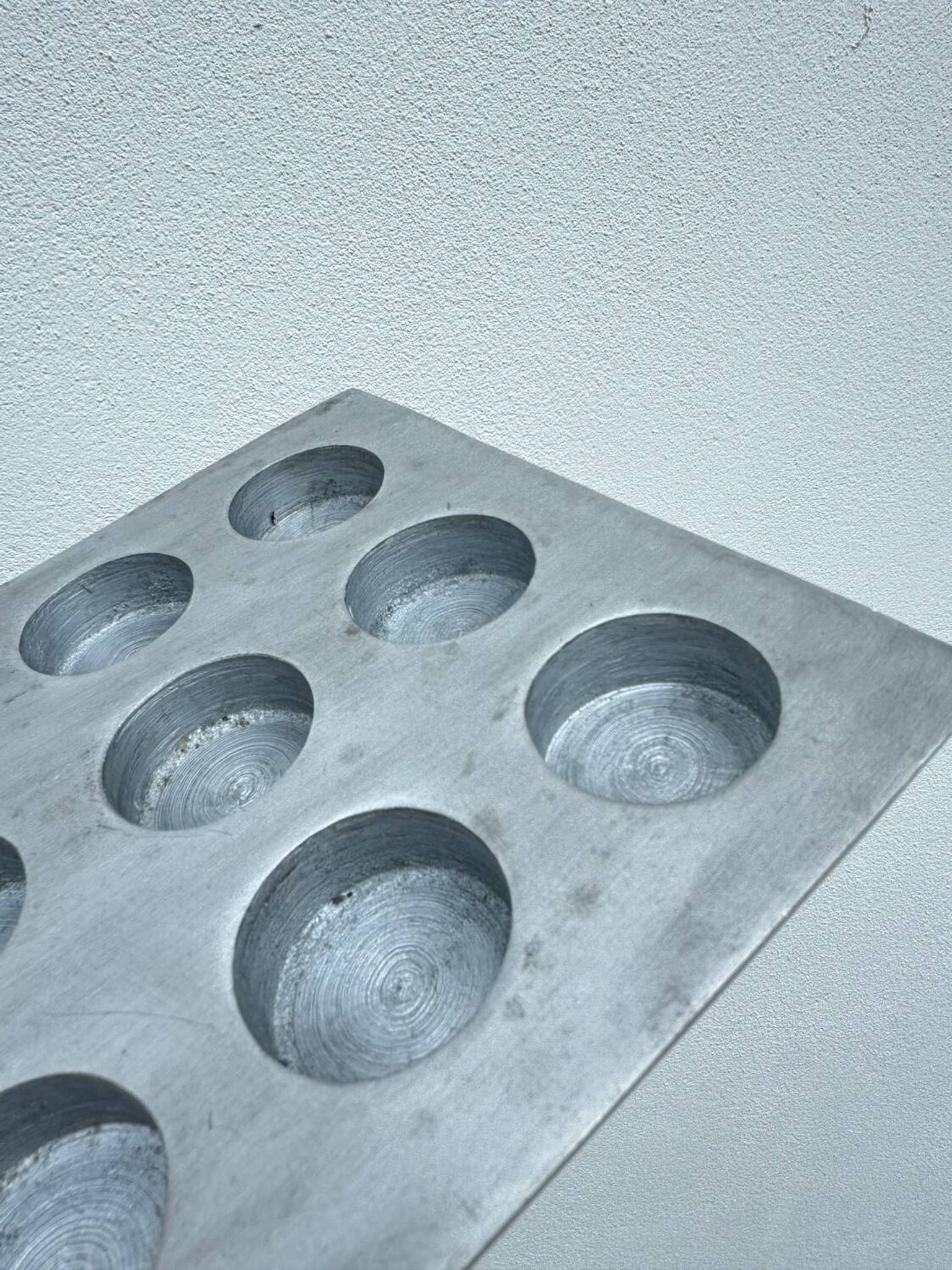 Brutalist style brushed aluminum candle holder