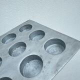 Brutalist style brushed aluminum candle holder