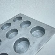 Brutalist style brushed aluminum candle holder