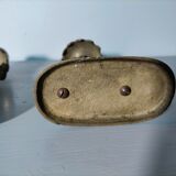 Pair of bronze hand candlesticks decorated with chimeras 19th century