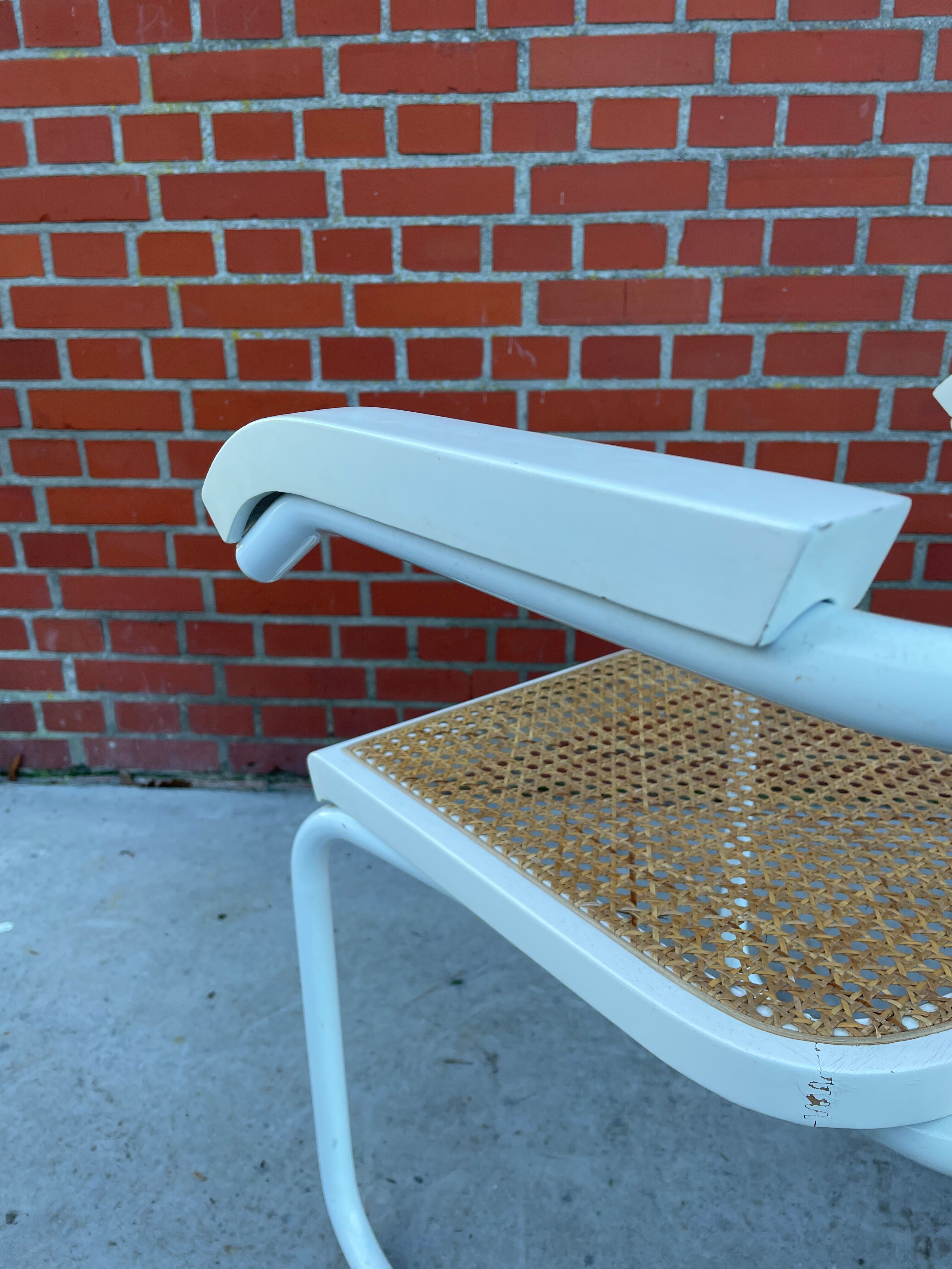 Cesca Chair model with armrest in white