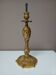 Pied de lampe en bronze,décor rocaille et volupte