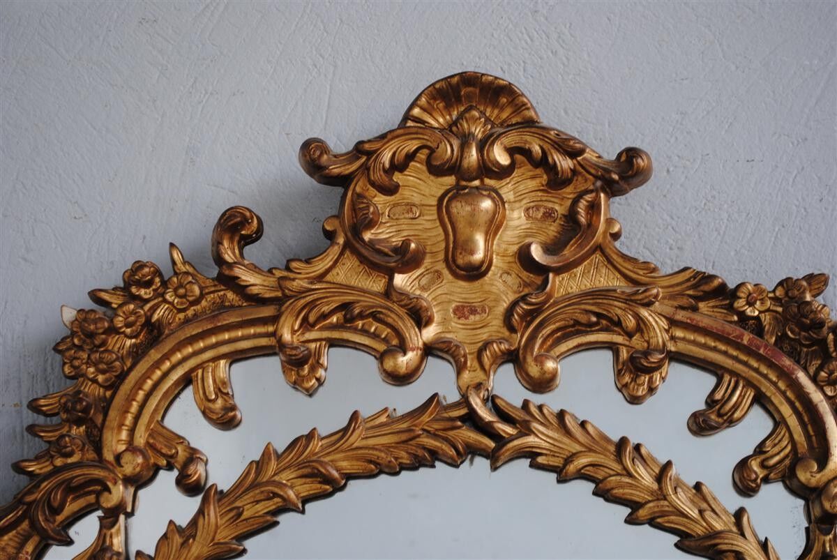 Mirror shield-close style Louis XV gold leaf gilding