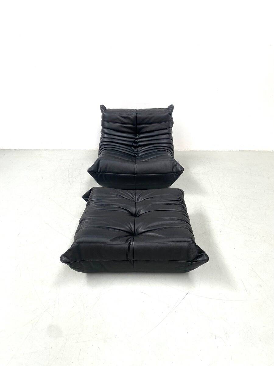 Set of French Togo lounge chair and ottoman in black leather attributed to Michel Ducaroy for Ligne Roset, 1970s
