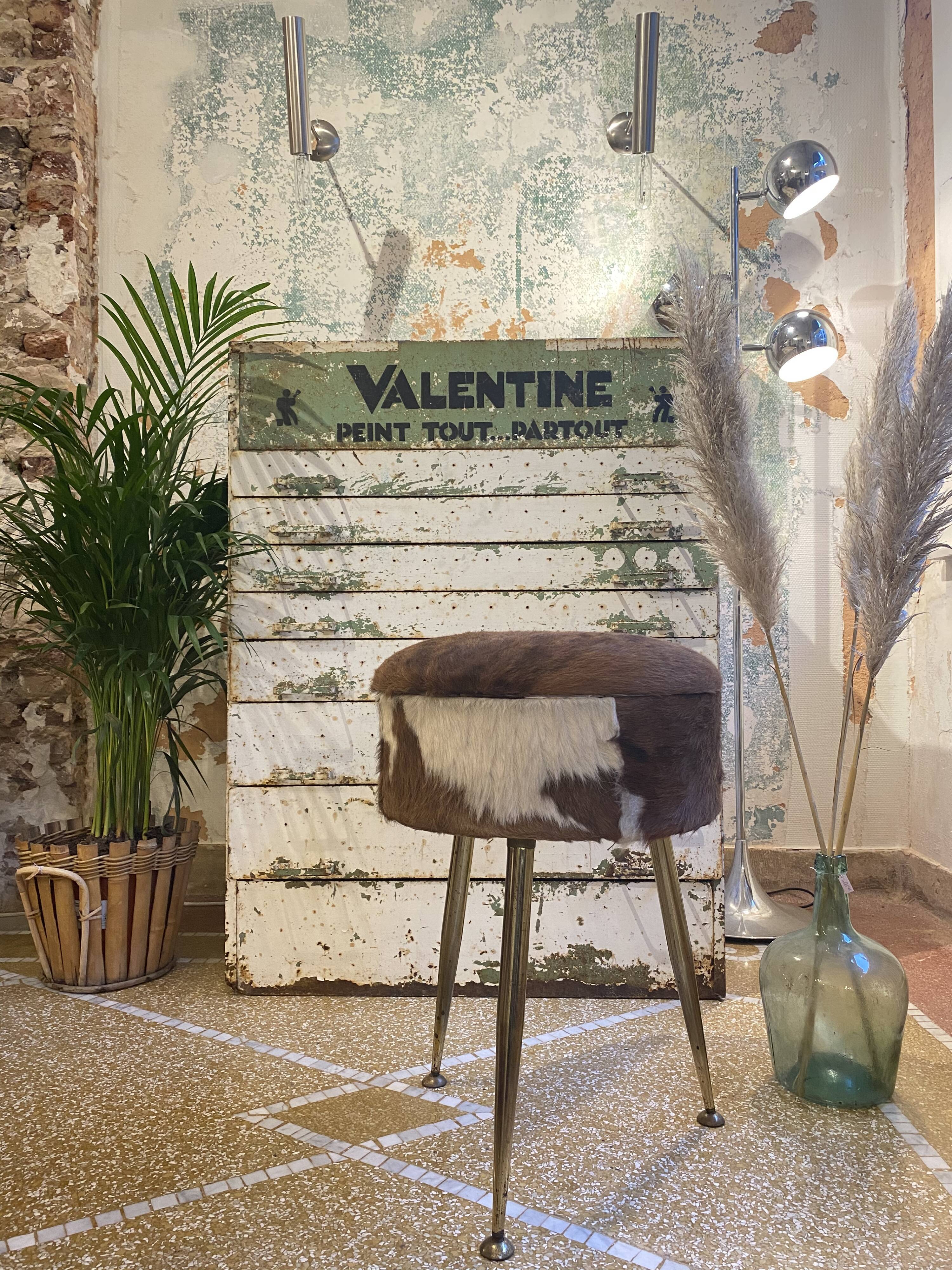 Tripod cowhide stool