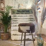 Tripod cowhide stool
