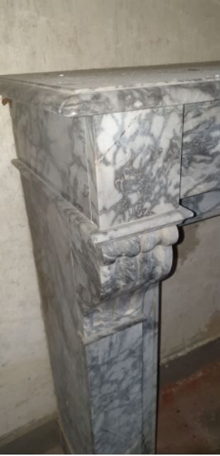 Fireplace modillon Napoleon III in gray marble of the nineteenth