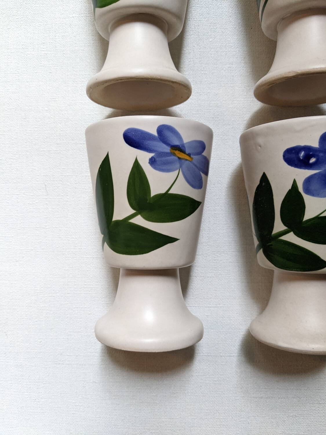 Ceramic mazagran with hand-painted floral decoration.