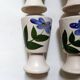 Ceramic mazagran with hand-painted floral decoration.