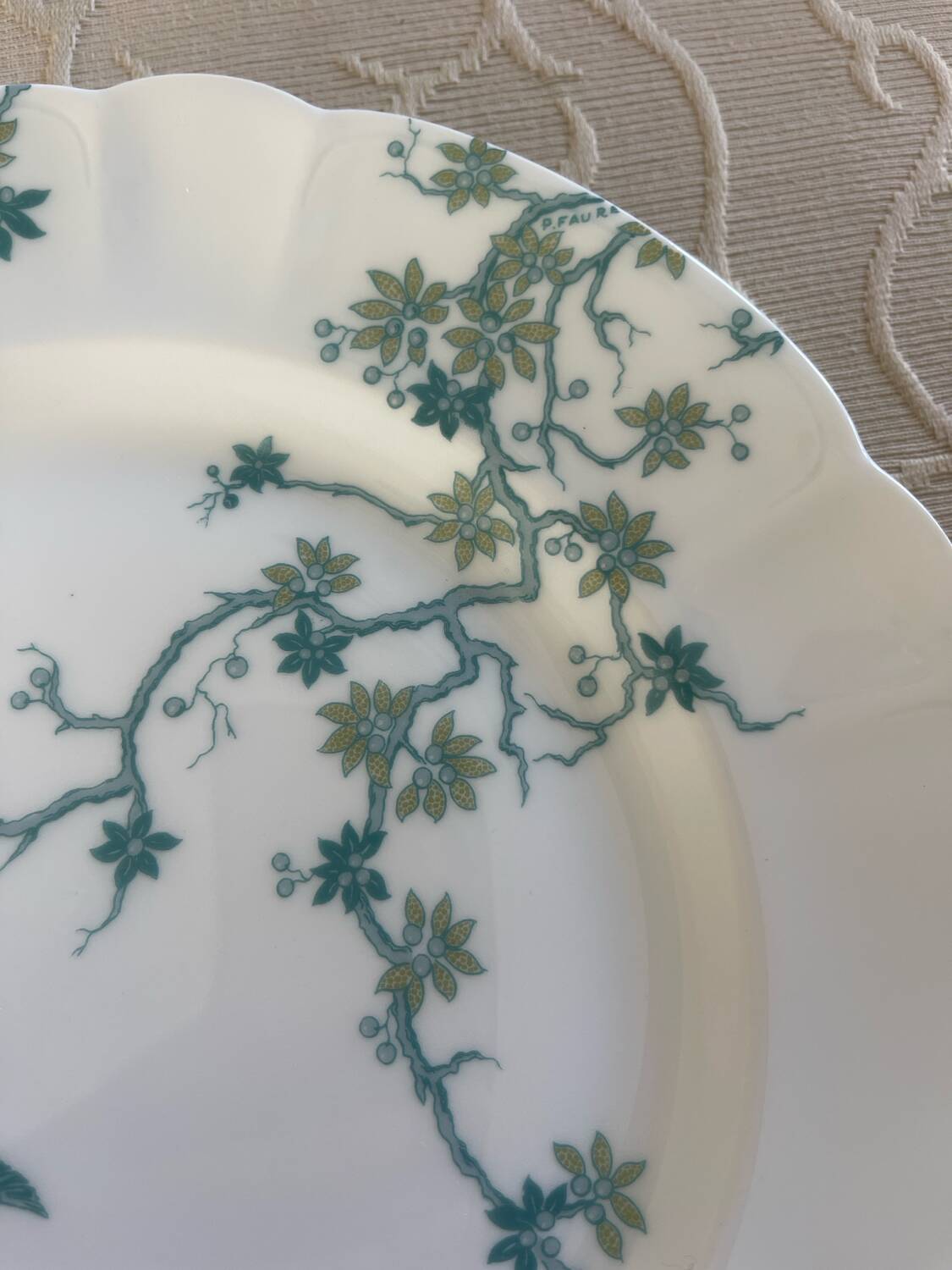 8 Haviland Limoges dinner plates.