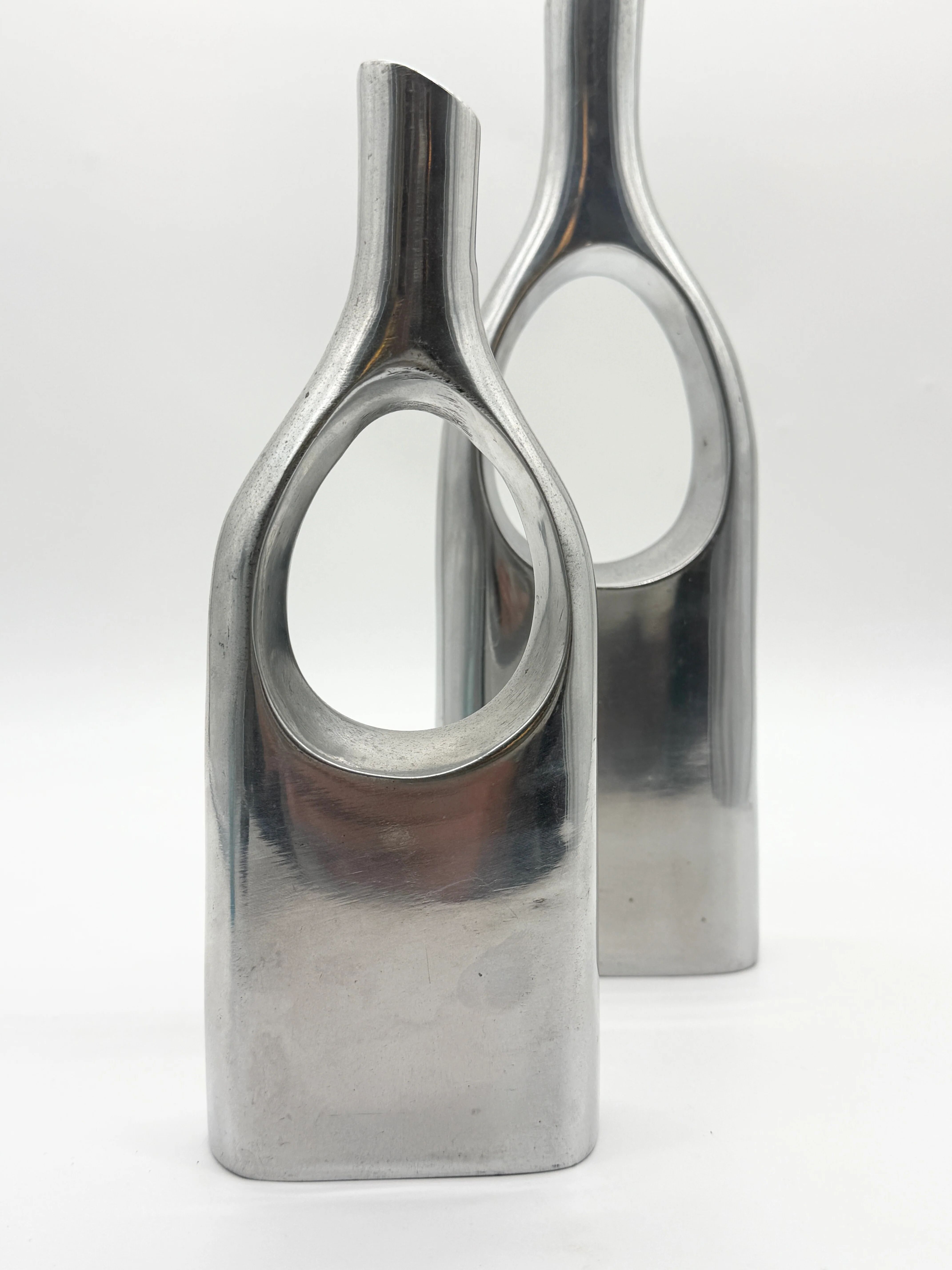 Pair of "drop" vases in aluminium cast, Italy, 1970s
