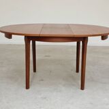 Round extendable teak table 1970