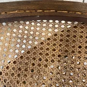 Pair of antique caned and wooden chairs from the 1900s.