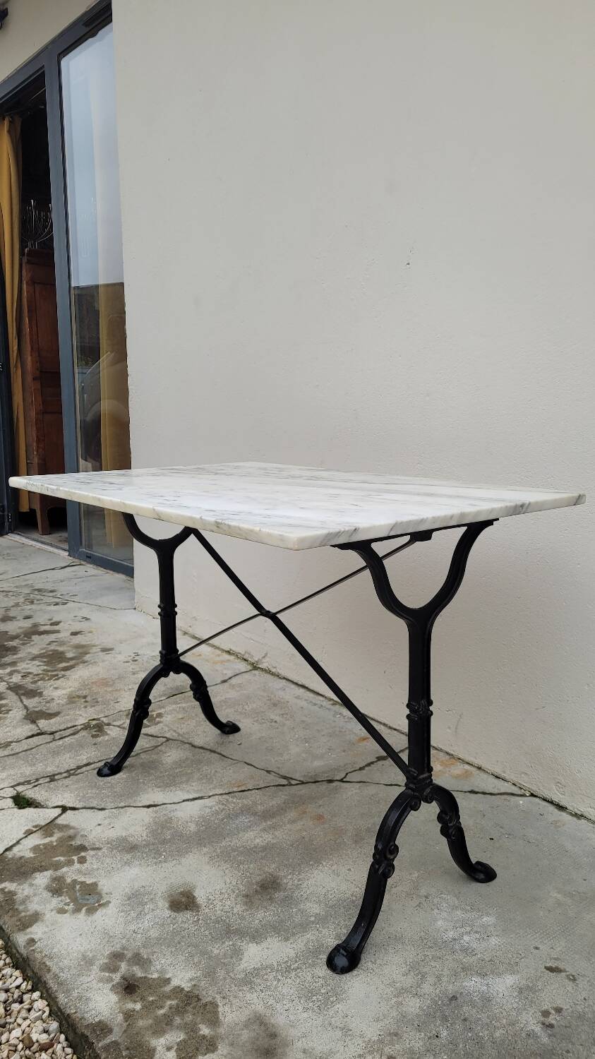 Marble and cast iron restaurant bistro table