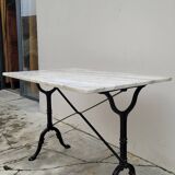 Marble and cast iron restaurant bistro table