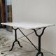 Marble and cast iron restaurant bistro table