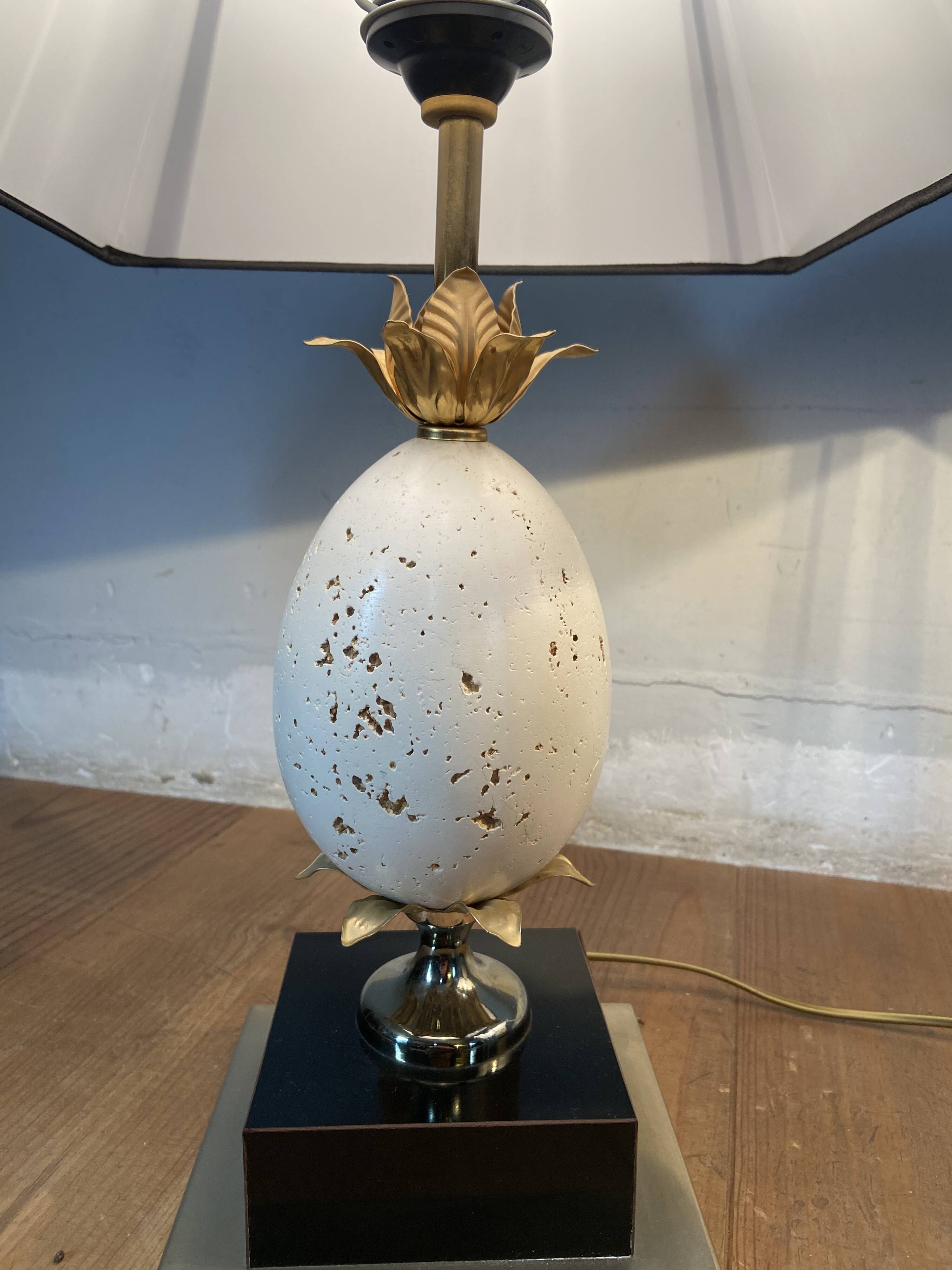Pair of designer ostrich egg lamps in travertine from maison barbier