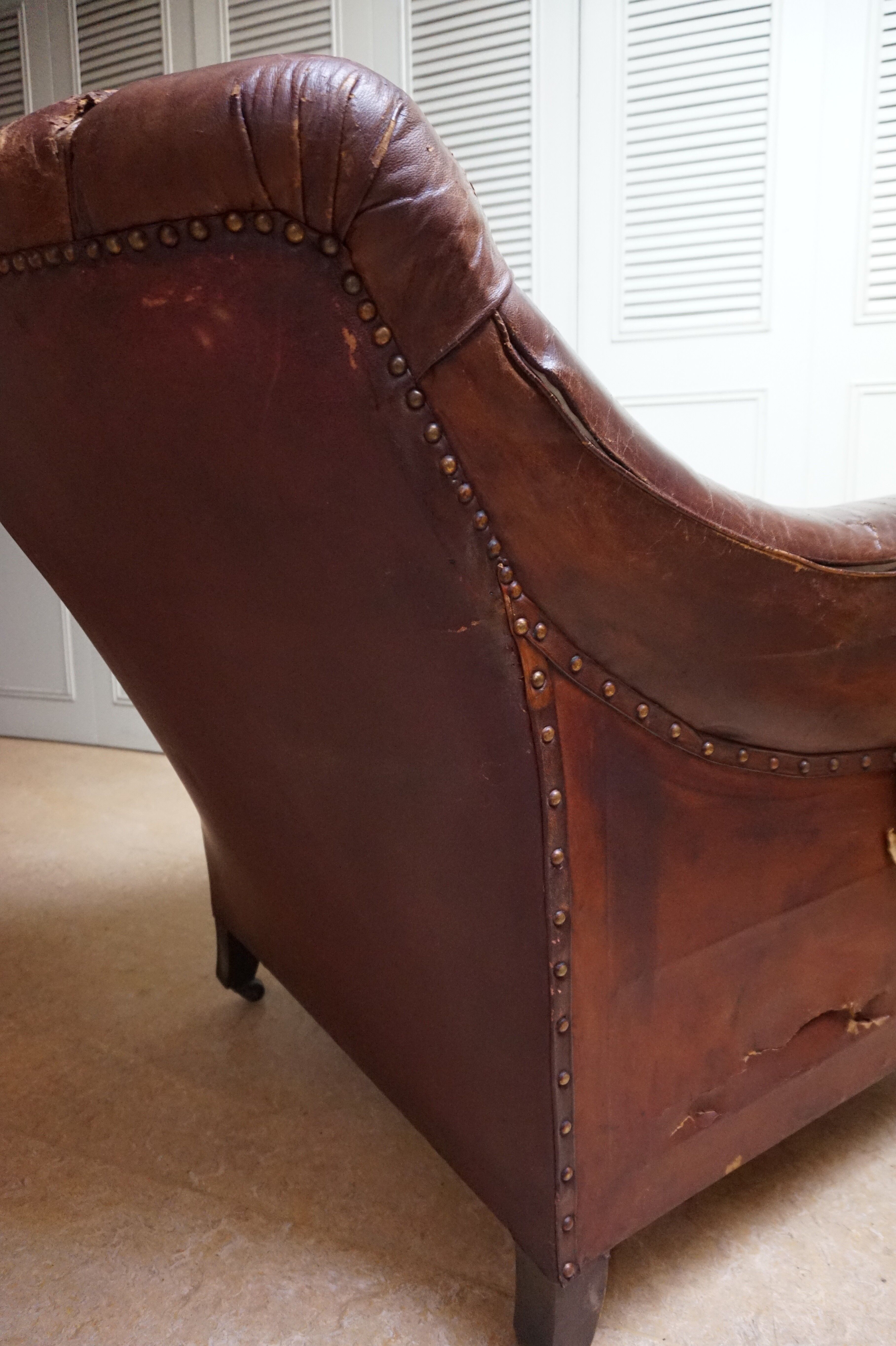 Worn Leather Buttoned Library Fireside Armchair, 1840's