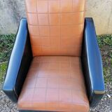 Paire de fauteuils en simili cuir
