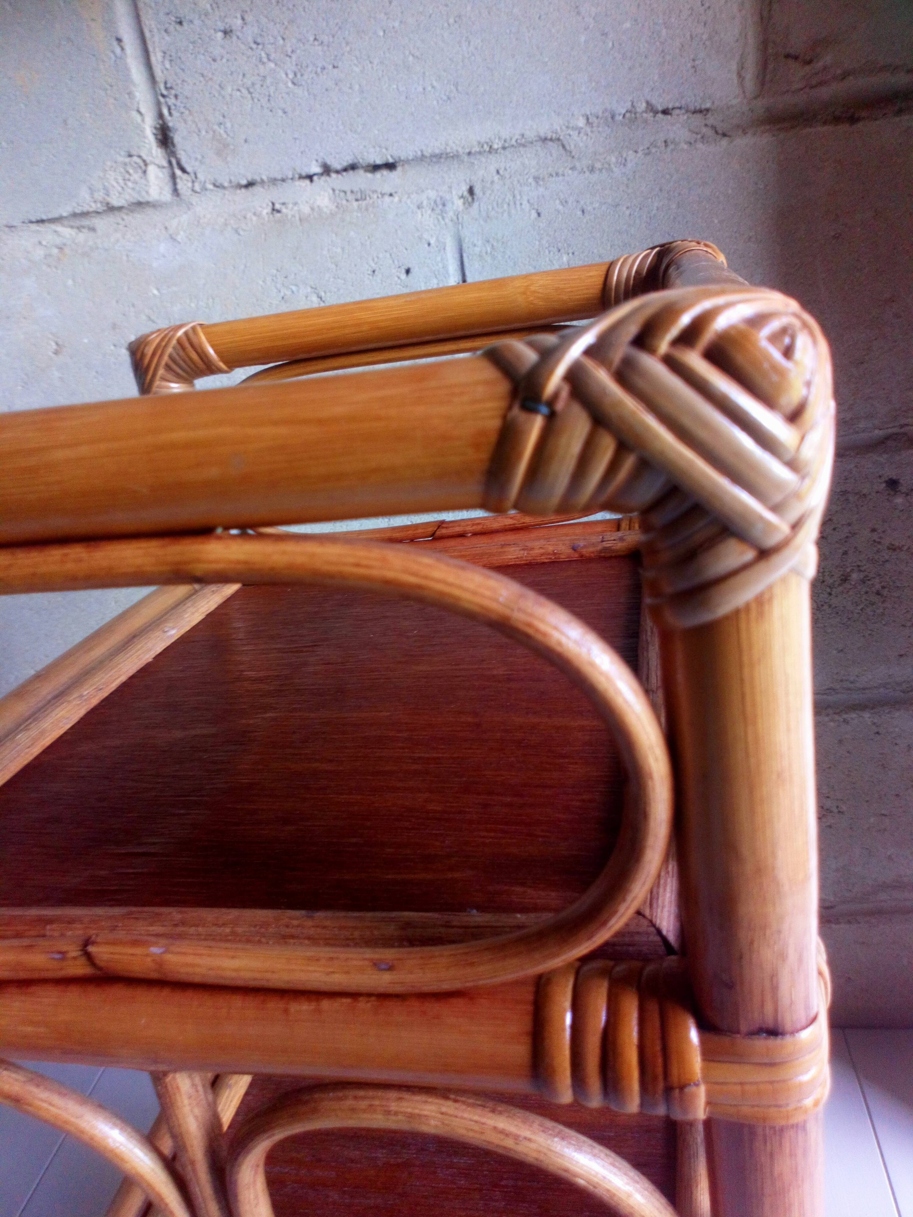Shelf selette on wooden feet and vintage rattan