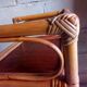 Shelf selette on wooden feet and vintage rattan
