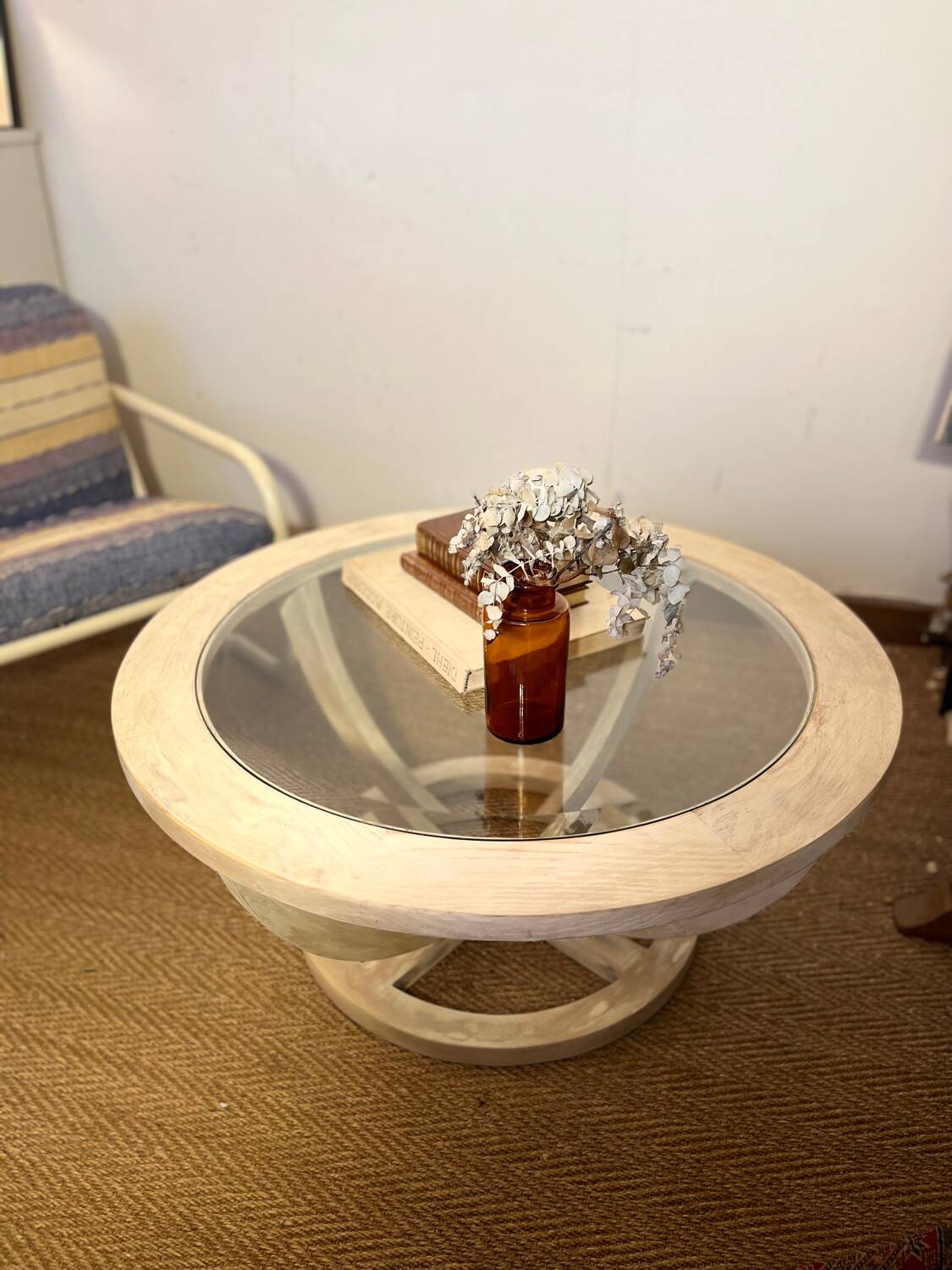 Oval patinated wood and beveled glass coffee table