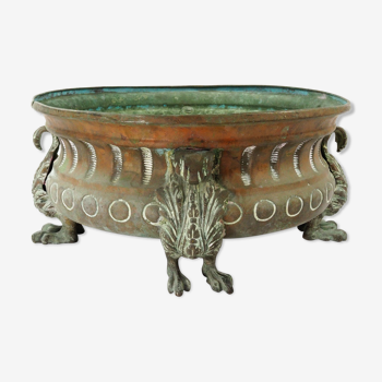 Repelled copper planter with acanthus and cast bronze legs, 1900s