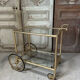 Vintage gold bar cart serving trolley