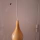 Suspension in opaline water droplet