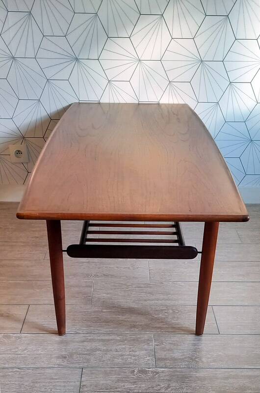 Danish 1960s teak coffee table with slatted shelf.