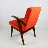Vintage armchair 300-123, design by M. Puchała, orange - available 2 pieces