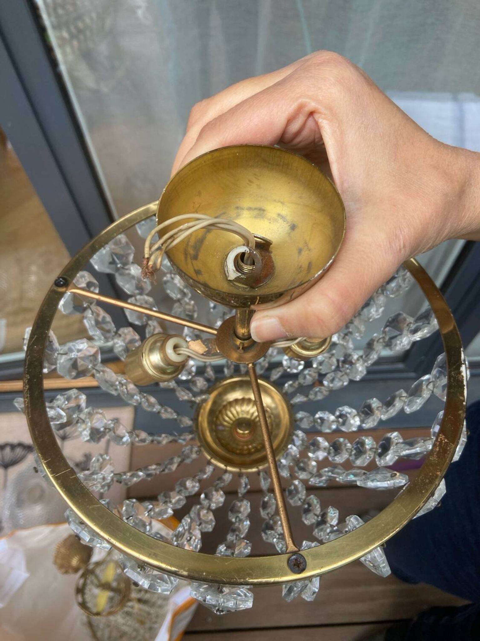 Crystal and brass chandelier pendants