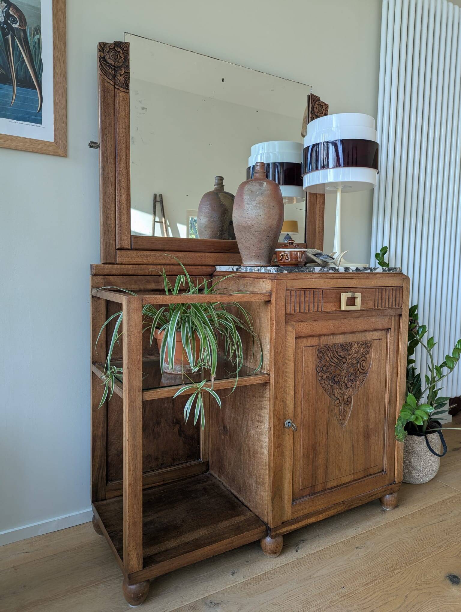 Art Deco wooden furniture with a swivelling mirror and marble top.