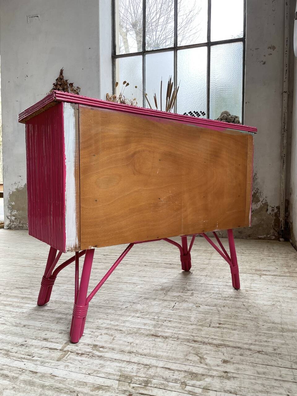 Vintage pink rattan chest of drawers