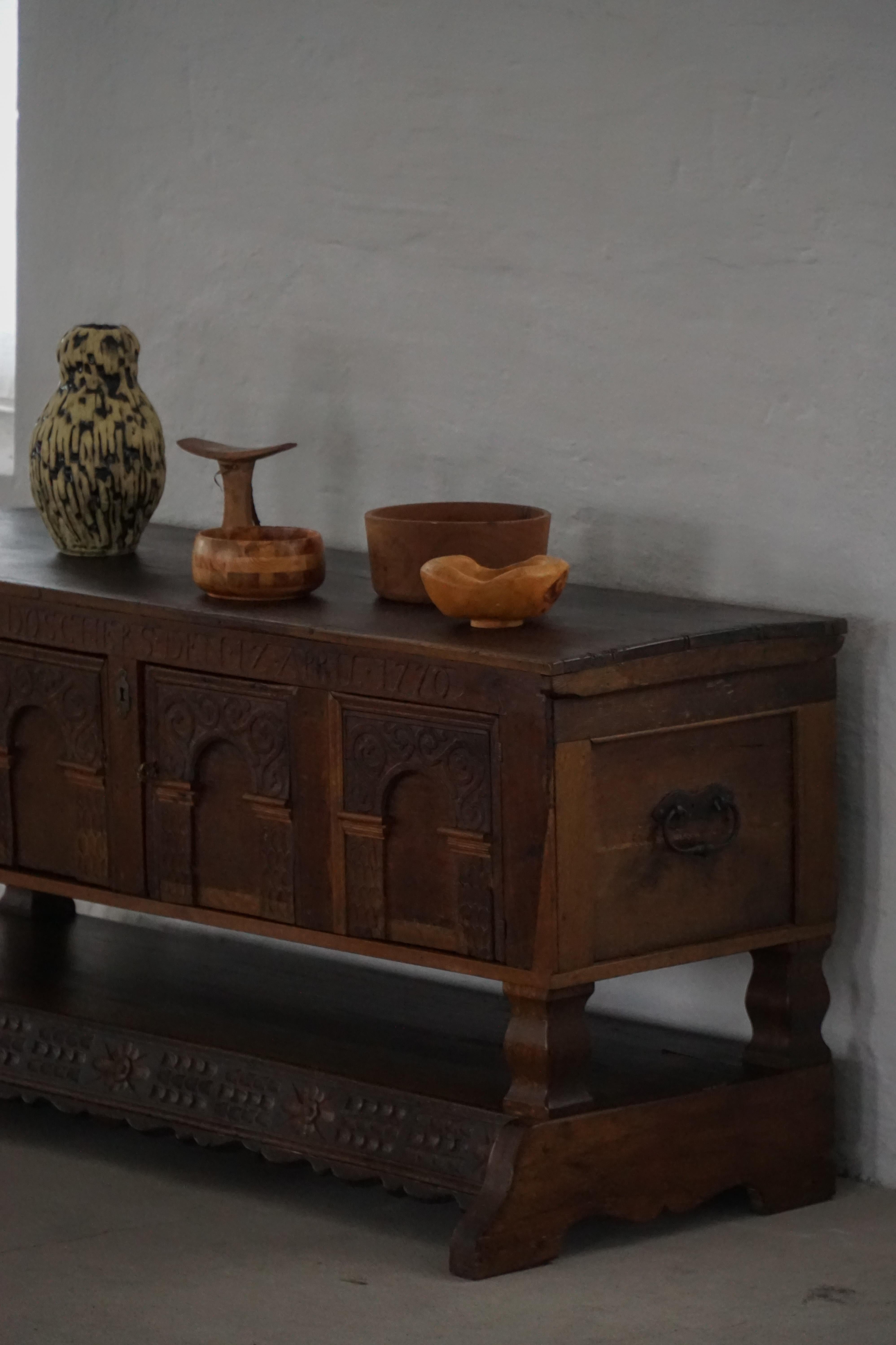 Danish baroque oak buffet from the early 18th century, carved details, 1700-1750.