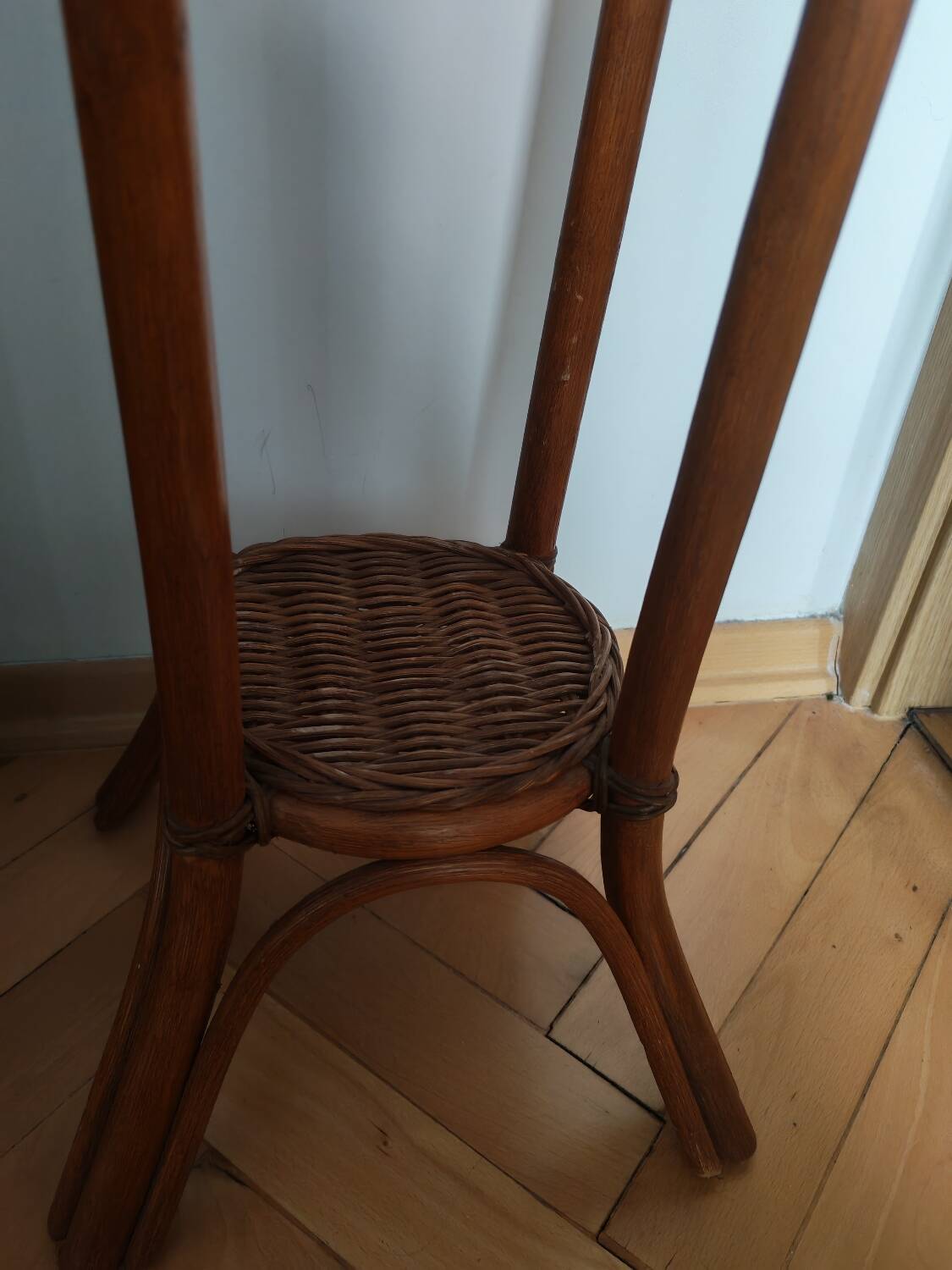 Woven wood and rattan plant stand